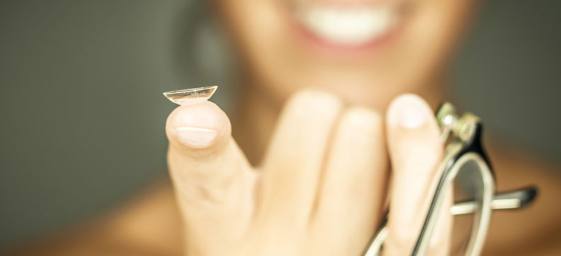 contact lens on fingertip